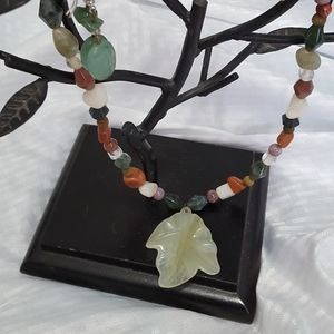 One of a kind made necklace, natural stones, and earrings.